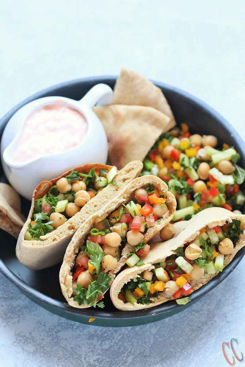 Balela Salad (Bah-lay-la salad) is Middle Eastern-style Chickpea salad. This hearty refreshing salad is bursting with zesty flavor. So easy, so delicious, nutrient dense and satisfying meal! It is perfect for any party or busy weeknight meal.