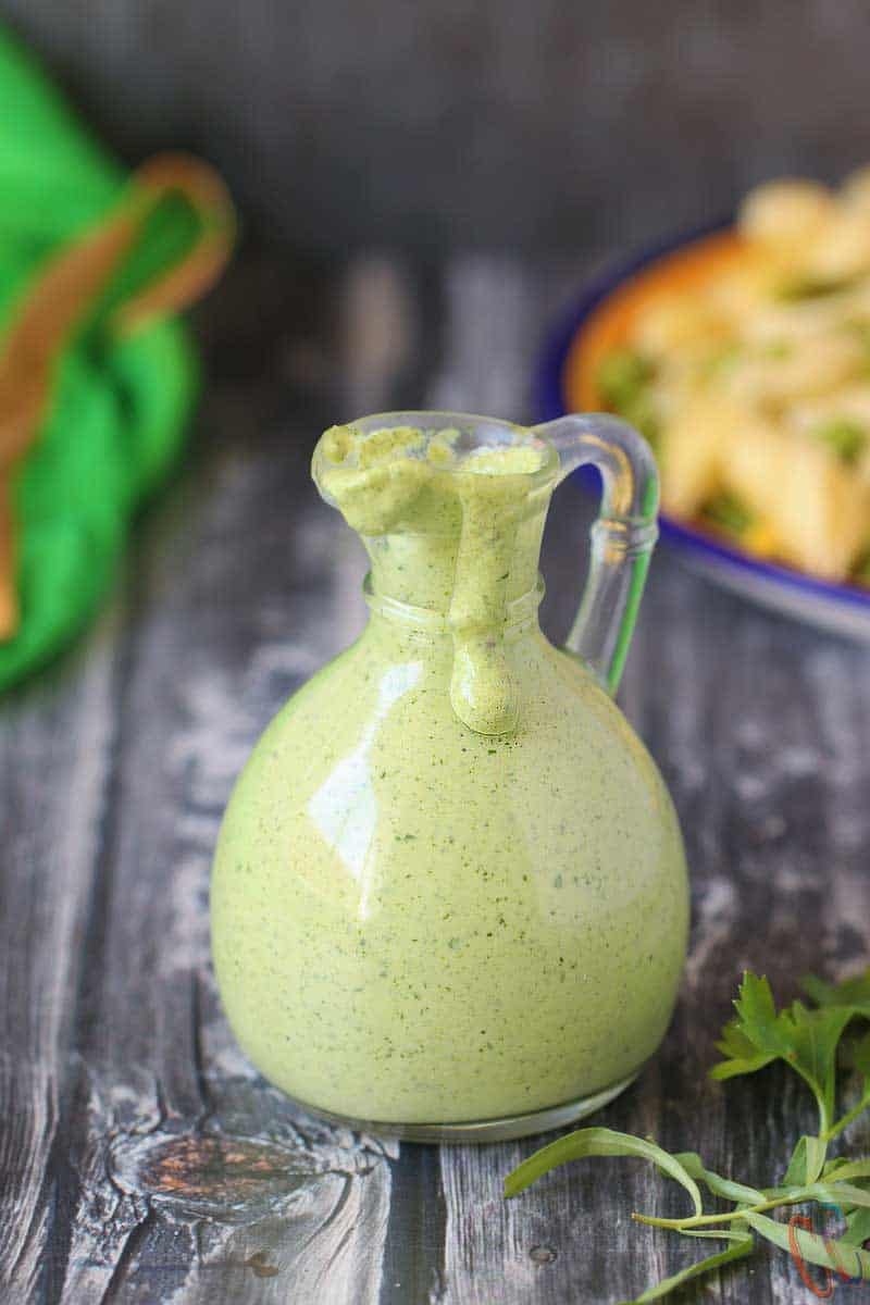 Green Goddess Dressing Recipe - A classic, creamy, aromatic and lip smacking salad dressing made with flat-leaves parsley, tarragon, green onions, mayonnaise, sour cream, garlic and lemon juice. Anchovy free dressing recipe.
