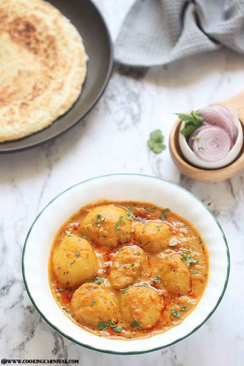 Instant Pot Dum Aloo - Best, Creamy, Scrumptious and Very Flavorful Indian Classic dish made of baby potatoes in a spicy onion-tomato-yogurt based gravy.