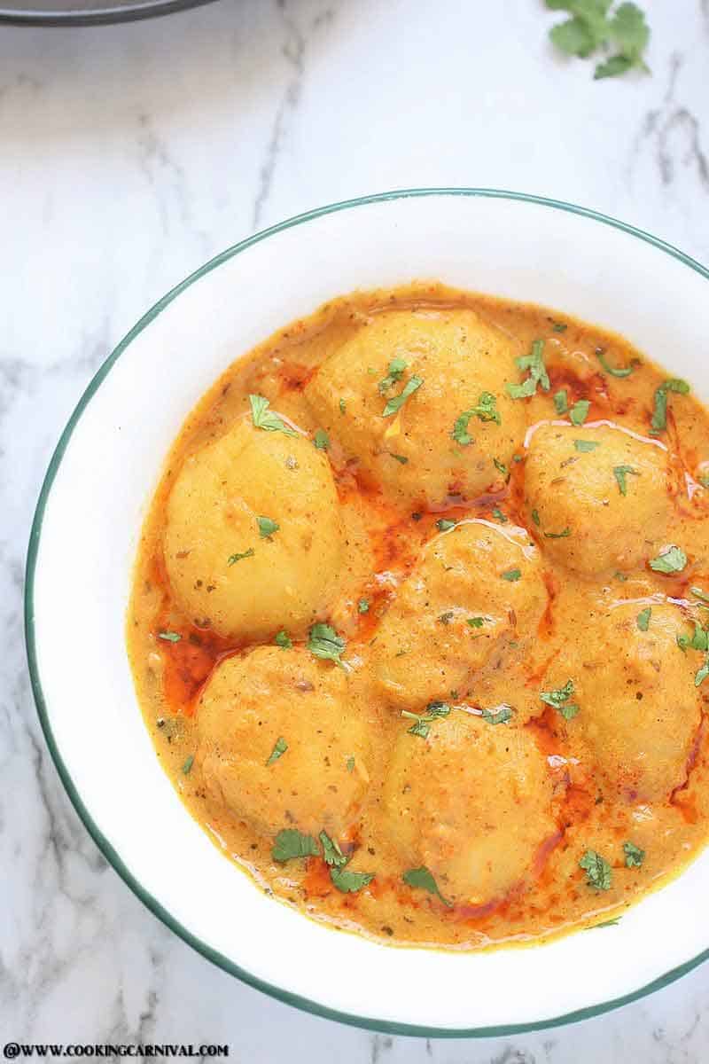 Instant Pot Dum Aloo - Best, Creamy, Scrumptious and Very Flavorful Indian Classic dish made of baby potatoes in a spicy onion-tomato-yogurt based gravy.