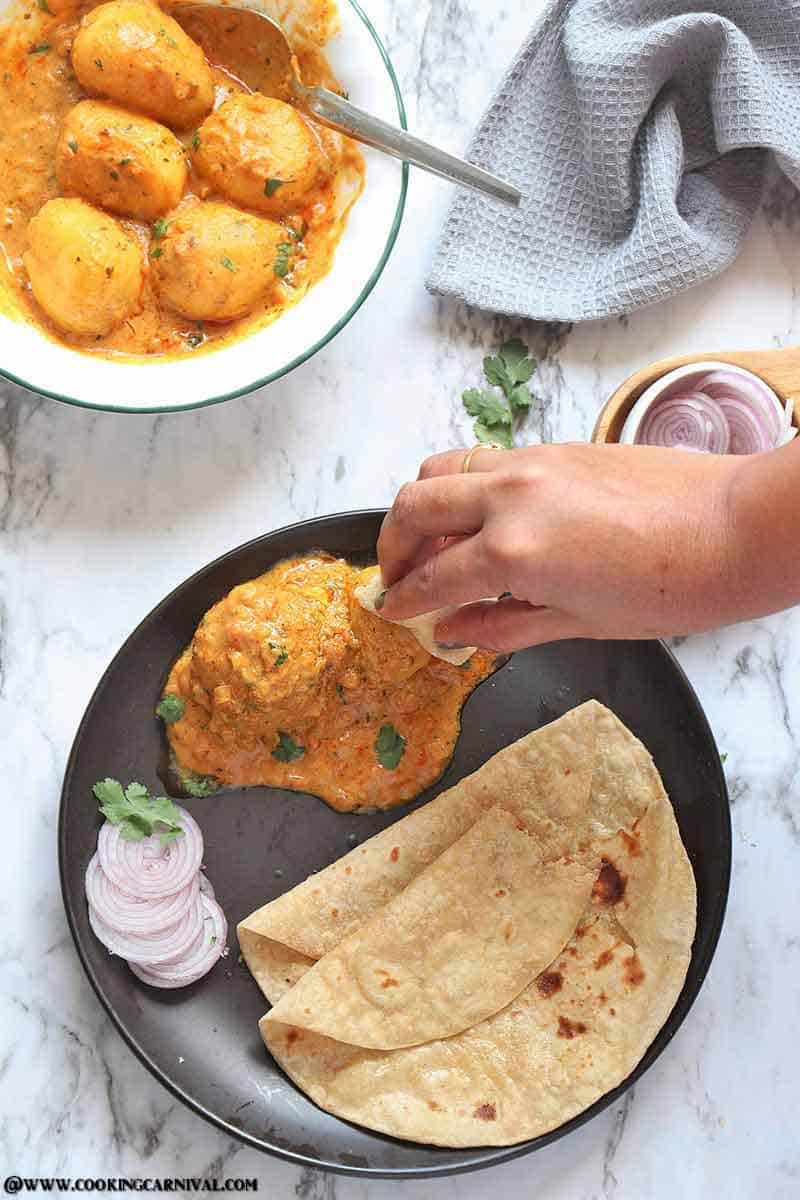 Instant Pot Dum Aloo - Best, Creamy, Scrumptious and Very Flavorful Indian Classic dish made of baby potatoes in a spicy onion-tomato-yogurt based gravy.
