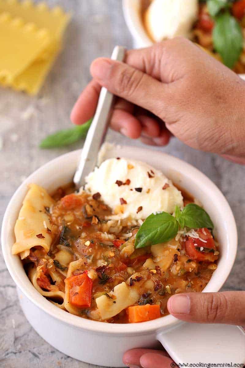 Lasagna soup in a bowl with spoon