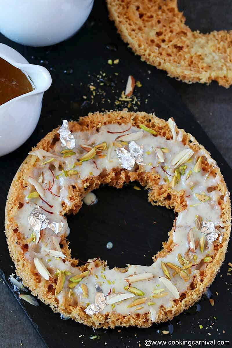 Rabdi ghevar on black tile