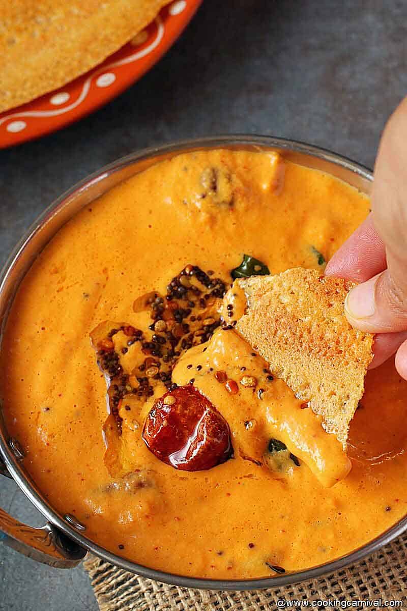 Taking chutney with adai dosa